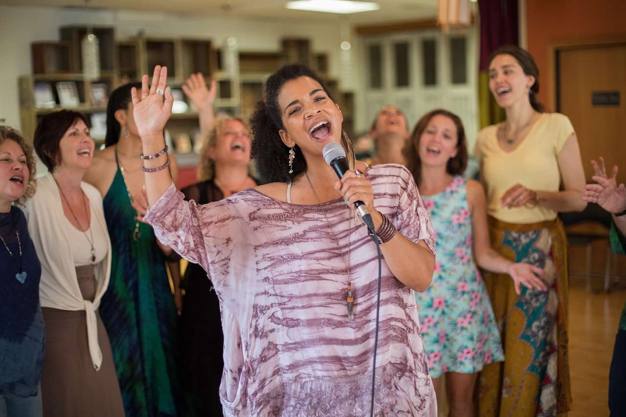 A woman fully expressing her voice
